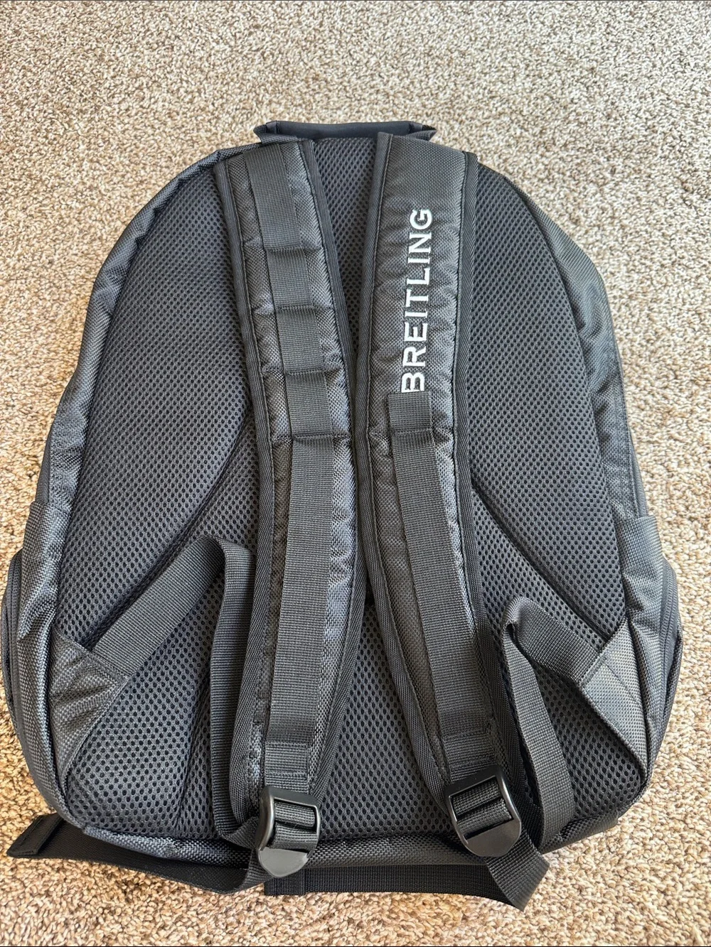 Breitling Green and Black Backpack with Bold Logo